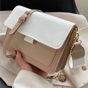 New never used tan purse with 2 straps